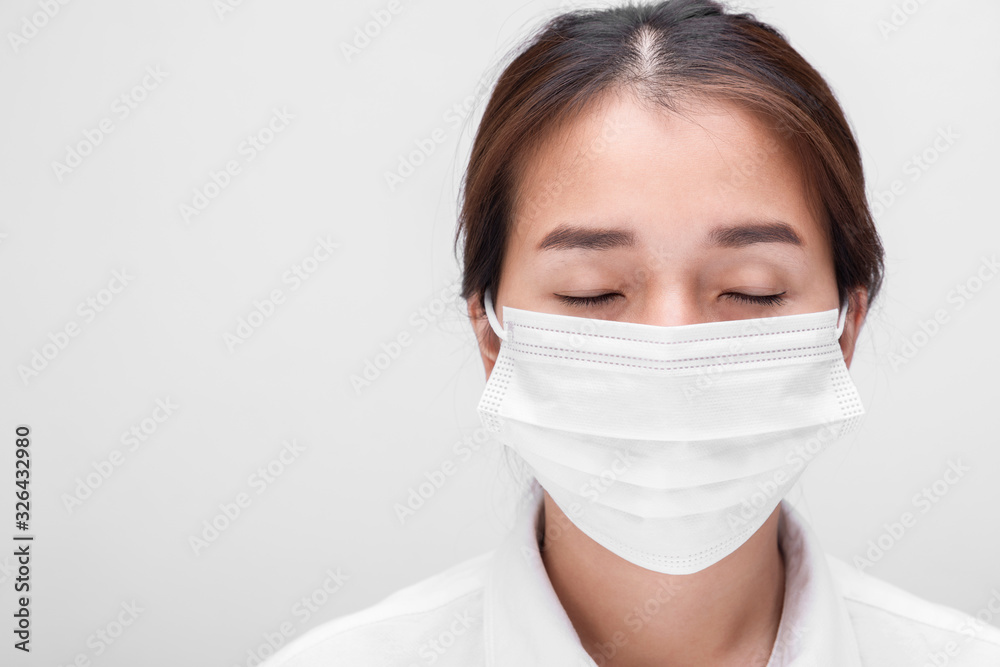 Young woman with face mask isolated on white background to prevent coronavirus & PM 2.5 air pollution, Woman demonstrate how to wear virus protective face mask. Young woman with face mask isolated on white background to prevent coronavirus & PM 2.5 air pollution, Woman demonstrate how to wear virus protective face mask.