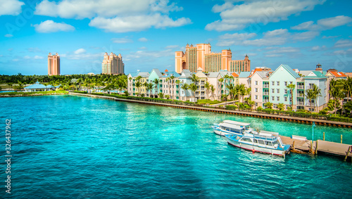 Skyline of Paradise Island with colorful houses at the ferry terminal. Nassau, Bahamas. 