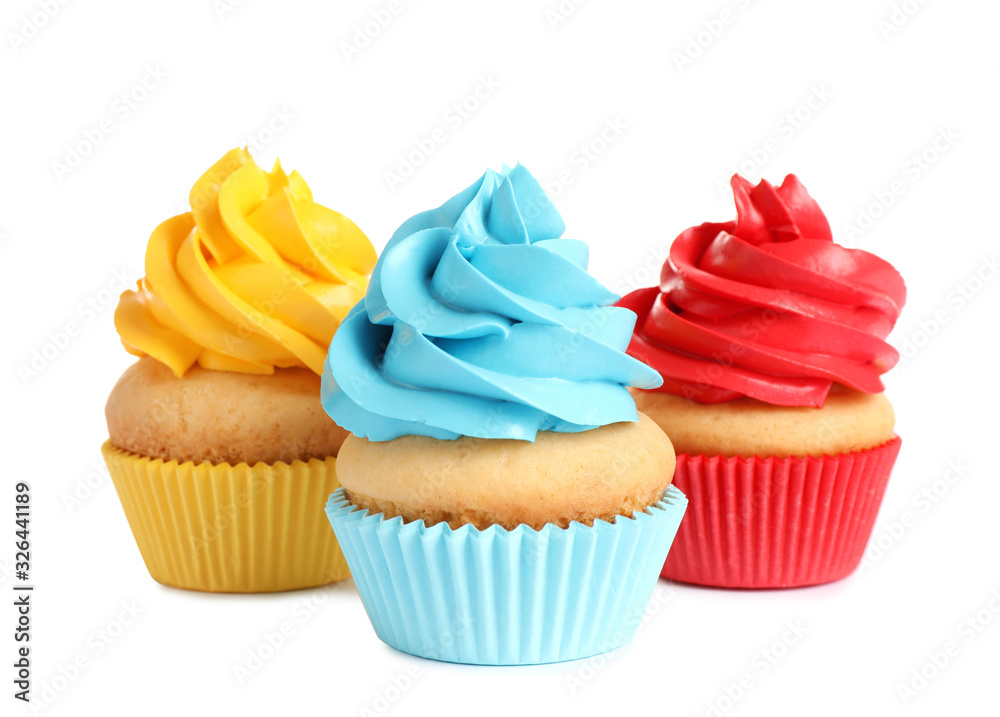 Delicious birthday cupcakes with buttercream on white background