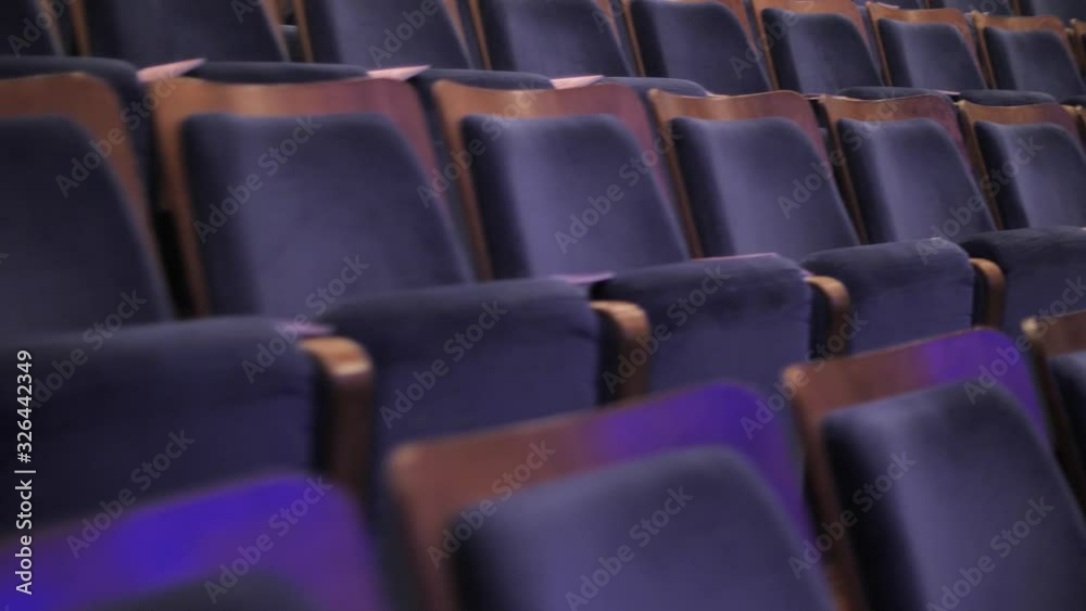 Close up view on rows of empty seats in auditorium
