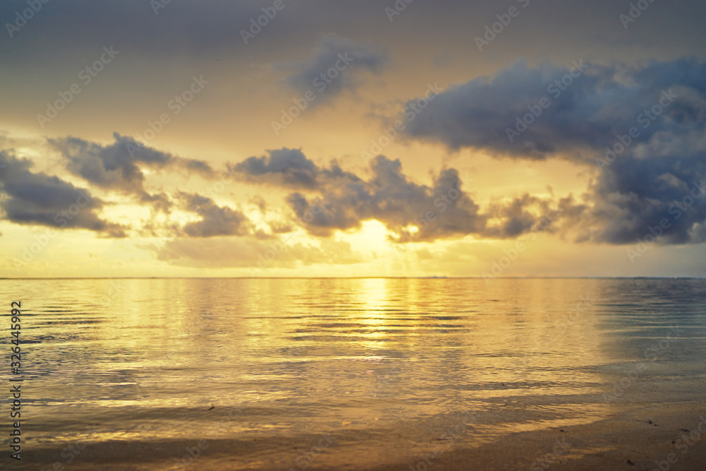 Beautiful seascape with sunrise cloudy sky.