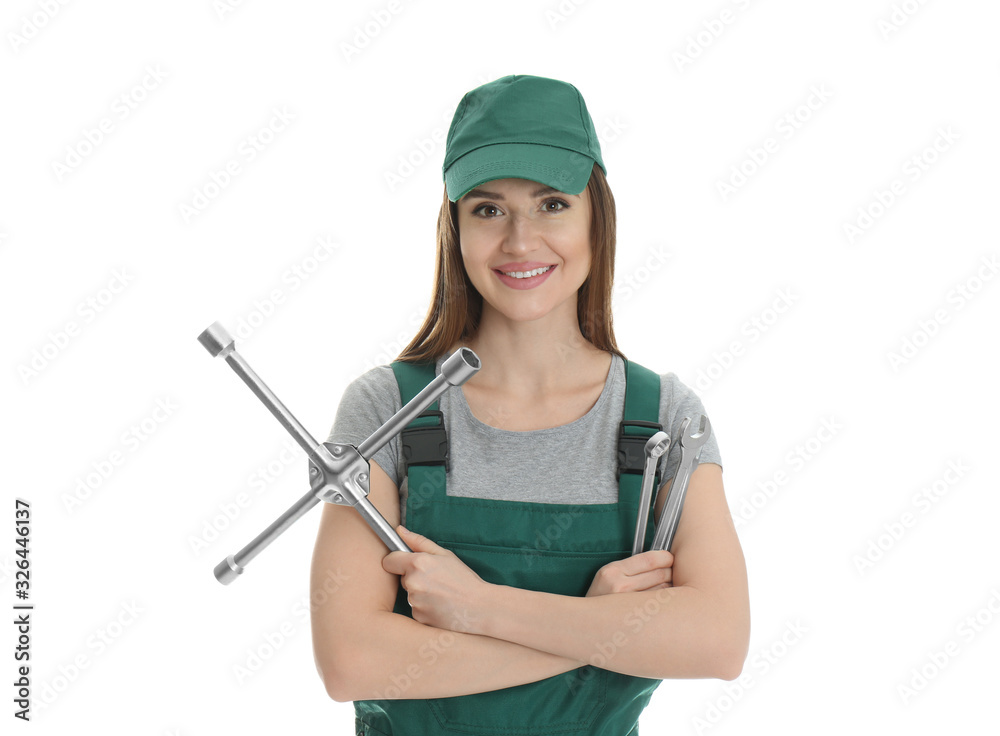 Portrait of professional auto mechanic with wrenches on white background Portrait of professional auto mechanic with wrenches on white background