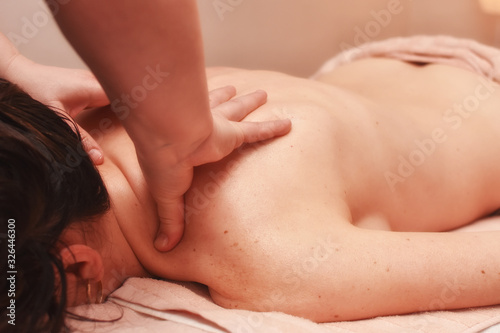 Woman having back massage. Body care  woman having massage in spa