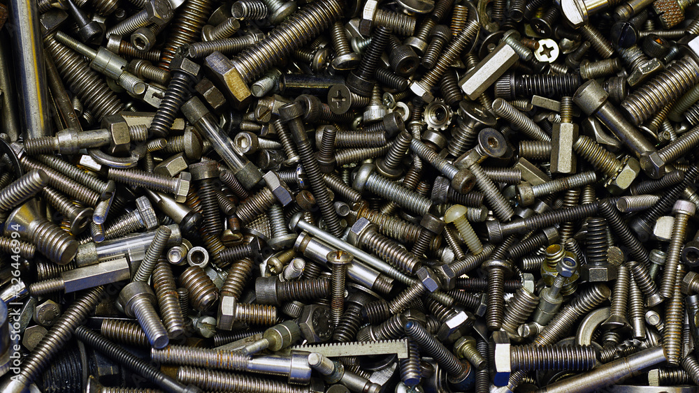A variety of sizes of steel and stainless steel nut backgrounds A variety of sizes of steel and stainless steel nut backgrounds