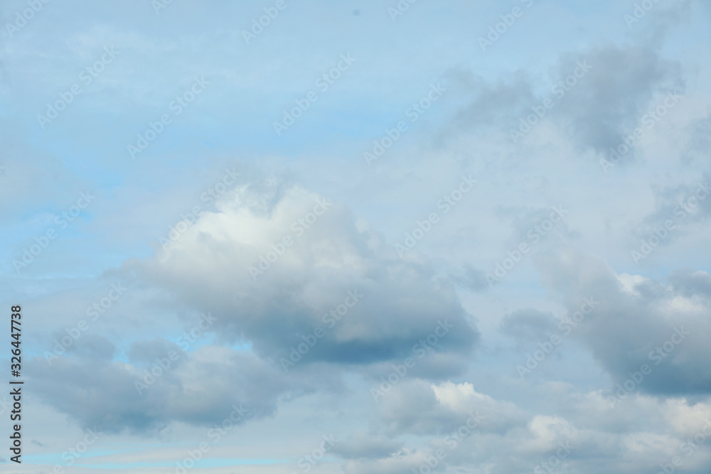 Obraz premium Beautiful blue sky with clouds on sunny day
