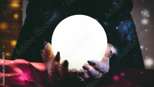 Quadro em tela Fortuneteller's hands with a crystal ball. Clairvoyance