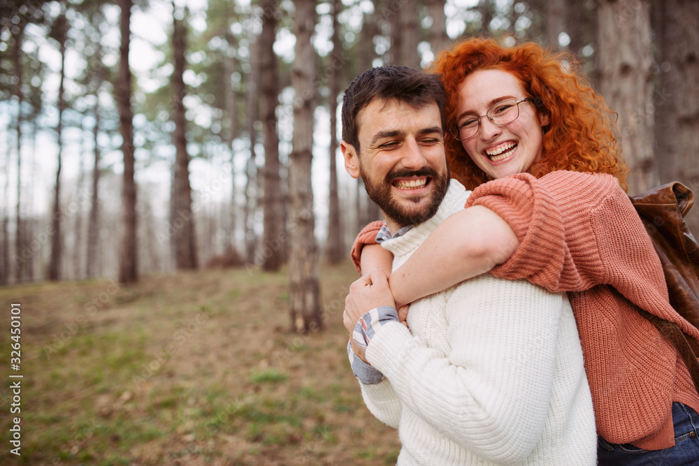 during the spring day a young happy couple expresses love for each other during the spring day a young happy couple expresses love for each other