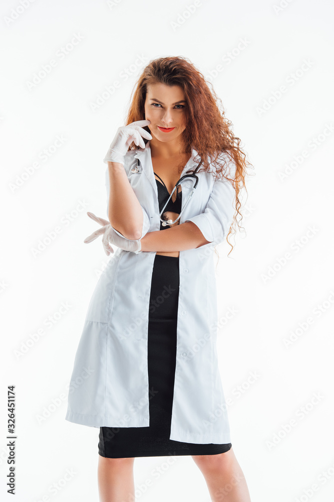 sexy nurse in latex gloves standing and looking at camera isolated on white sexy nurse in latex gloves standing and looking at camera isolated on white
