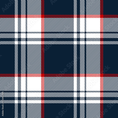 Tartan plaid pattern background. Seamless dark check plaid graphic in navy blue, red, and white for scarf, flannel shirt, blanket, throw, duvet cover, or other autumn winter fabric design.