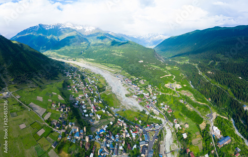 Panoramic view of Svan Towers in Mestia, Svaneti region, Georgia. It is a highland townlet in the northwest of Georgia, at an elevation of 1500 meters in the Caucasus Mountains. photo