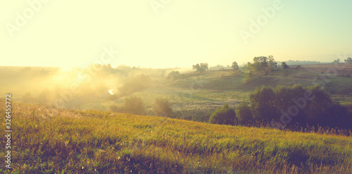 sunrise over a fields