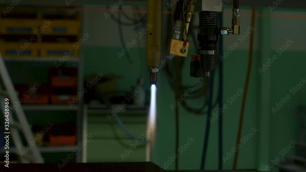 Plasma cuts iron plate slow motion Plasma cuts iron plate slow motion