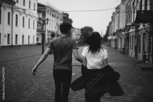 Hugging loving boy and girl outside