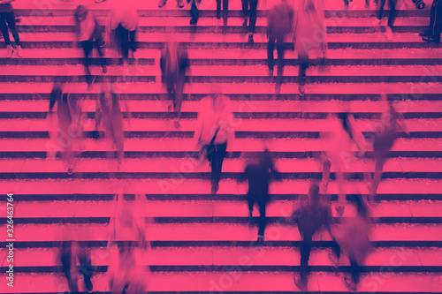 Overhead view of people walking up the stairs in Central Park, New York City with pink and blue color effect