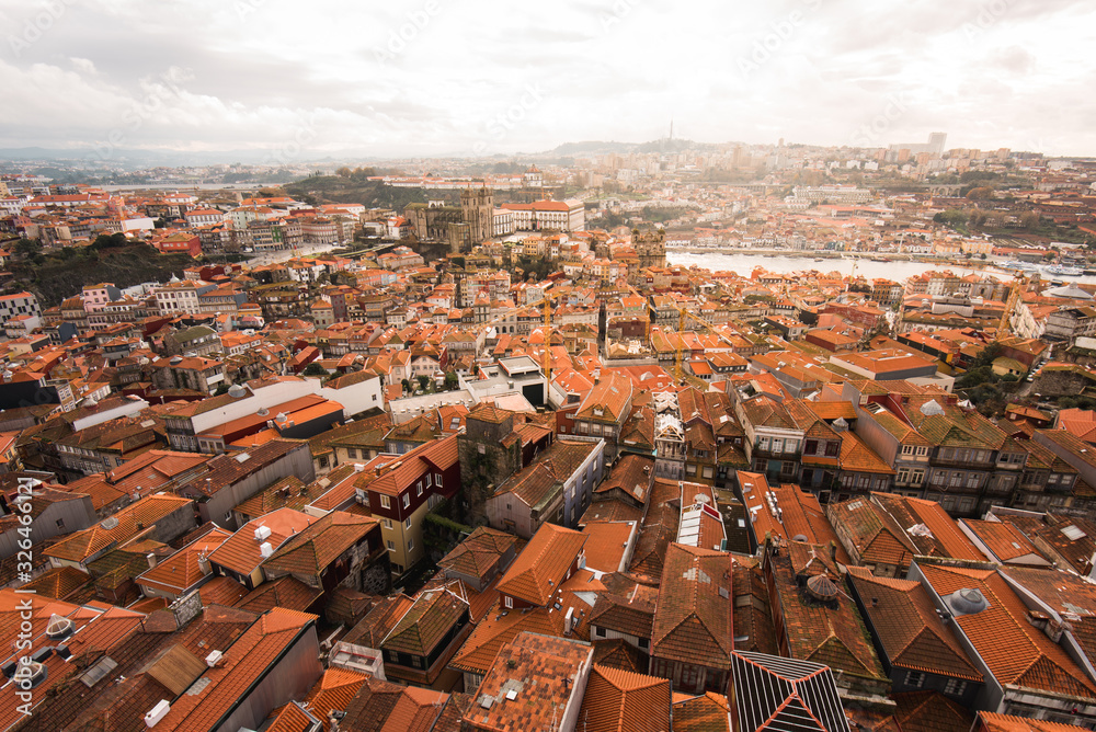 Aerial View of Red Tiled Rooftops of Houses in the Historical Part of the City of Porto, Portugal