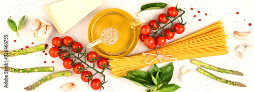 Flat lay with traditional italian pasta spaghetti and cooking ingredients. Traditional italian cusine concept. Top view