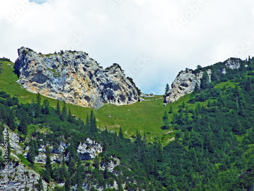 Rocks and stones of the Liechtenstein Alps mountain massiv and over the Naaftal alpine valley - Malbun, Liechtenstein photo