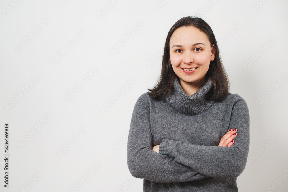 Portrait of a beautiful young girl, folded hands in front of her, isolated on white. Portrait of a beautiful young girl, folded hands in front of her, isolated on white.