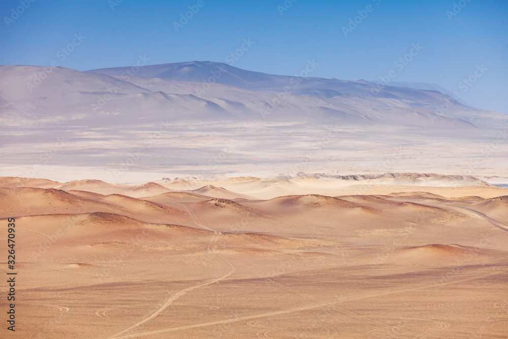 View of the endless desert of Paracas National Reserve, dunes, sands. Peru.