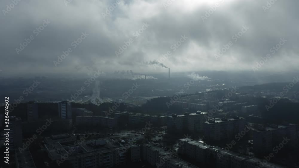 Urban industrial aerial panorama, smoke and fog at sunrise, big city Urban industrial aerial panorama, smoke and fog at sunrise, big city