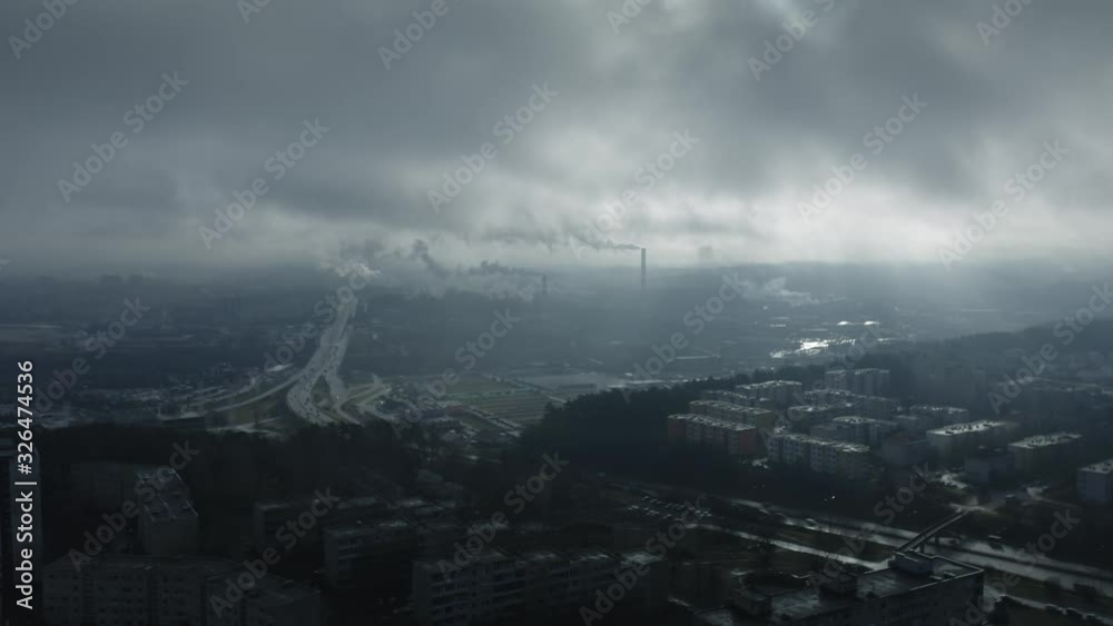 Urban industrial aerial timelapse, smoke and fog at sunrise, big city Urban industrial aerial timelapse, smoke and fog at sunrise, big city