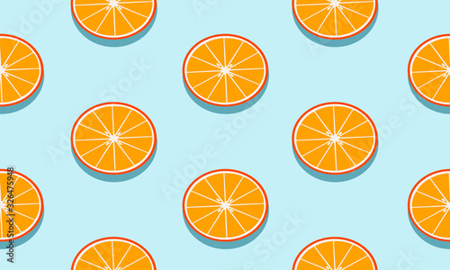 Seamless blue background with mandarins slices with shadow. Vector fruit design for pattern or template.