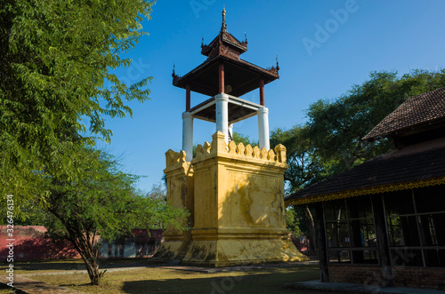 The Clock Tower, or Bahozin inside Mandalay royal Palace compound, Myanmar. Traditional burmese architecture photo
