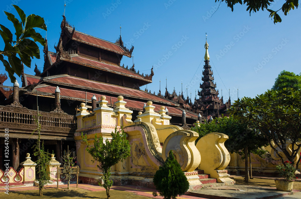 Fototapeta premium Shwe In Bin teak monastery with intricate detailed wood carving. Mandalay, Myanmar (Burma)