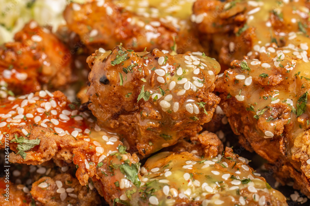 Crispy Fried chicken with sauces and spices Crispy Fried chicken with sauces and spices