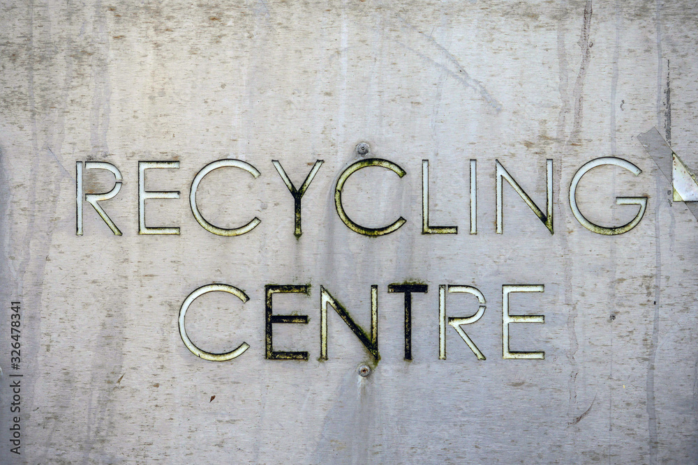 Old worn metal sign recycling center. Concept ecology, Old worn metal sign recycling center. Concept ecology,