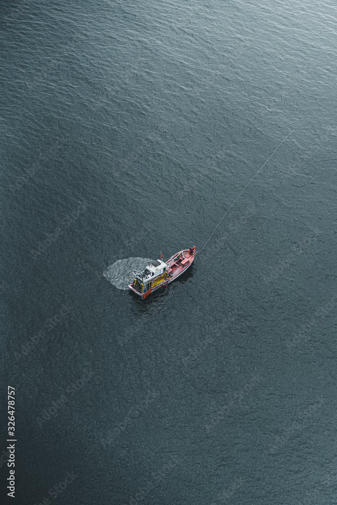 Lonely fisherman deep in the sea near coast of Vietnam Lonely fisherman deep in the sea near coast of Vietnam