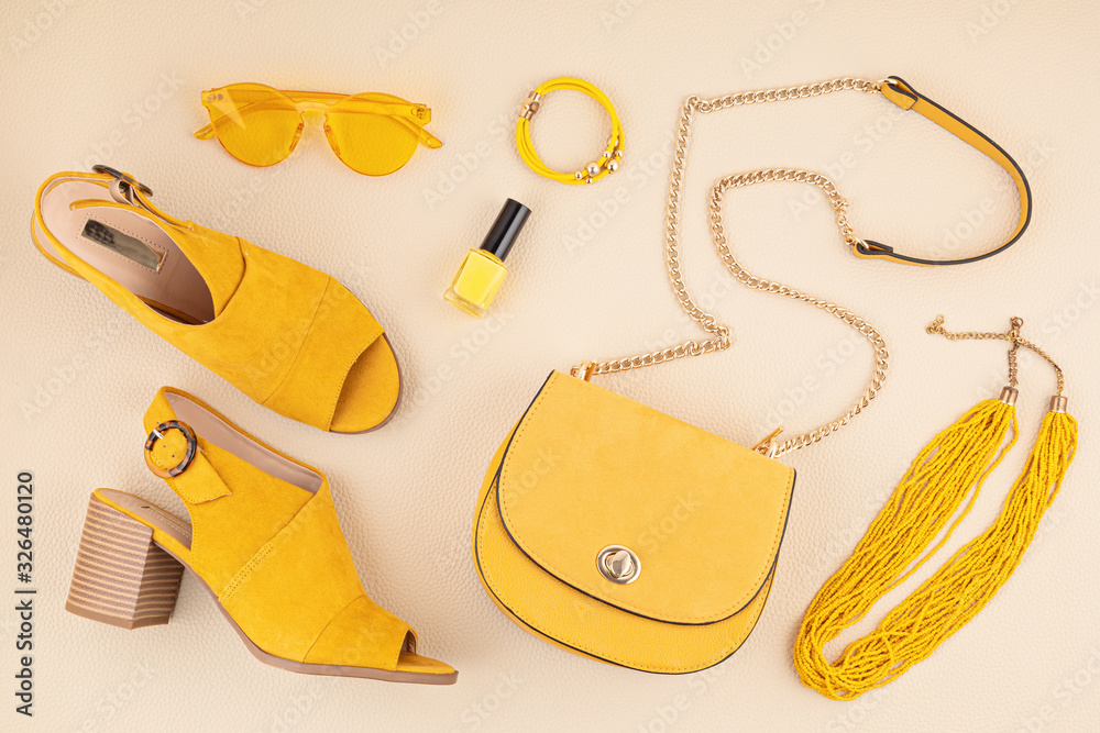 Flat lay with woman fashion accessories in yellow and blue colors. Fashion blog, style, shopping and trends idea Stock Photo | Adobe Stock