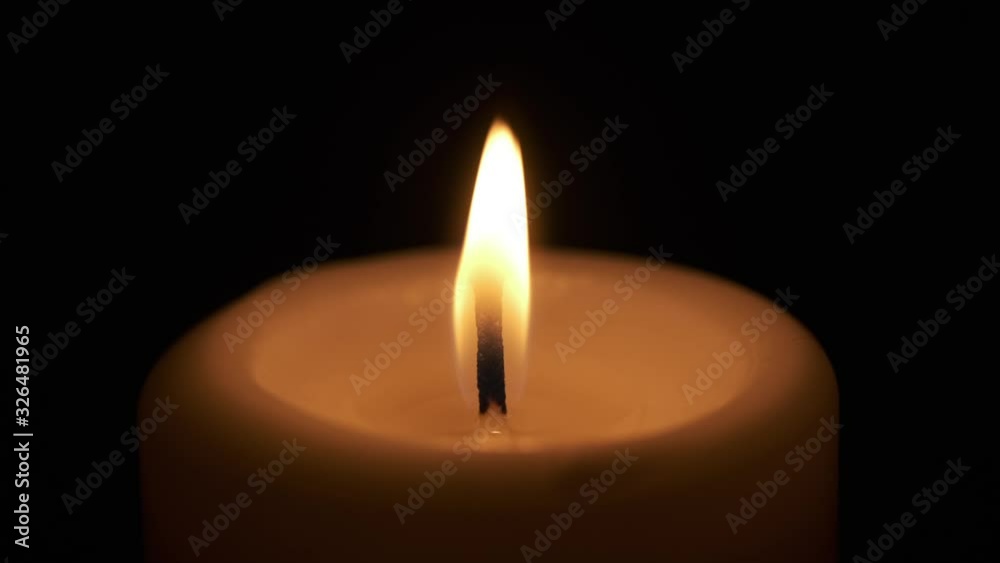 Single Candle Flame Burning in Dark Room Single Candle Flame Burning in Dark Room