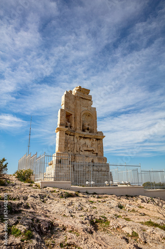 Philopappos Monument, blue sky background. Athens, Greece,