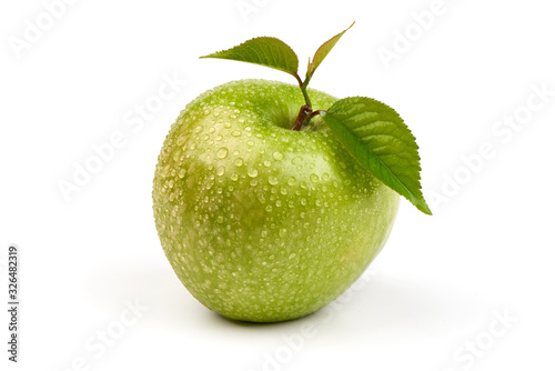 Whole green apple granny smith with leaf, isolated on white background