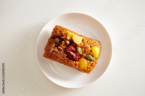 Yaksik, Korean sweet rice cake with dried fruit and nuts  photo