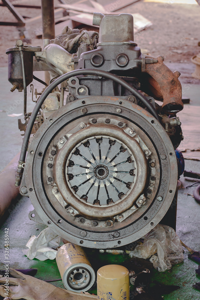 Automobile machine waiting to be repaired by an engineer. Automobile machine waiting to be repaired by an engineer.