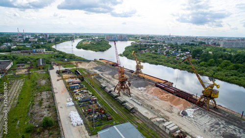 the cranes at the docks and river photo