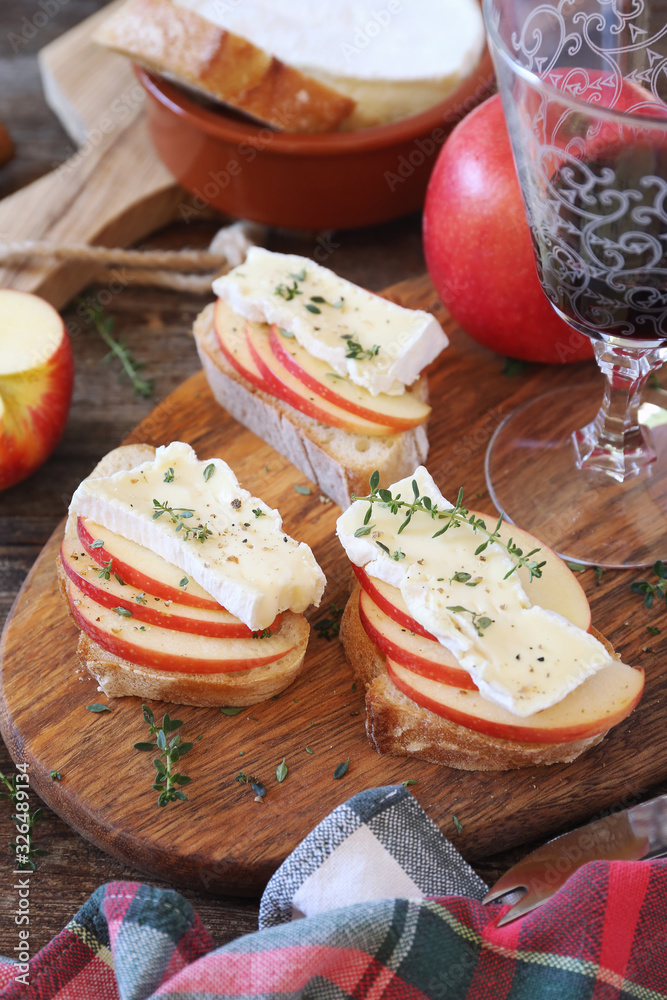 Appetizer. Apples and Camembert cheese bread toast and red wine. Healthy savory sandwich Appetizer. Apples and Camembert cheese bread toast and red wine. Healthy savory sandwich