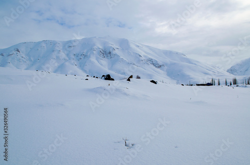winter landscape with road and blue sky