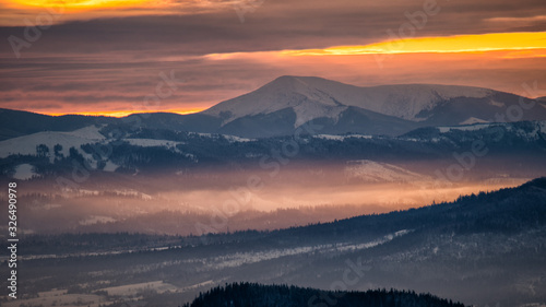 Fototapeta Naklejka Na Ścianę i Meble -  Inversion in the mountains. Gorgany seen from the Tarnica Mt in Poland. Carpathian Mountains.