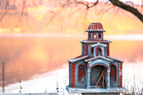 Fototapeta Naklejka Na Ścianę i Meble -  Roadside shrines erected in memory of those who lost their lives in road accidents are a common sight across Greece. Ioannina Epirus Greece city