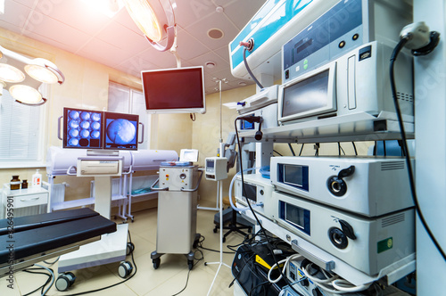 Medical devices, Interior hospital design concept. Interior of operating room in modern clinic, screen with tests. Closeup