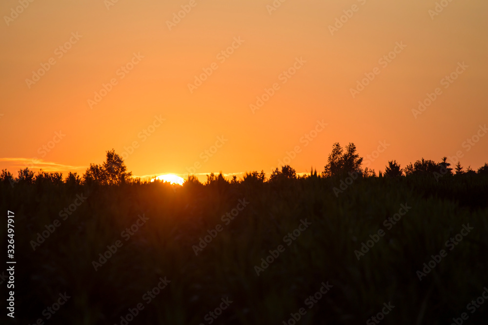 Sunset over the fields. Agricultural landscape in eastern Lithuania.