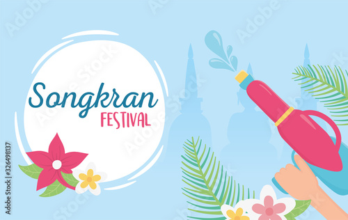 songkran festival hand with water guns flowers celebration