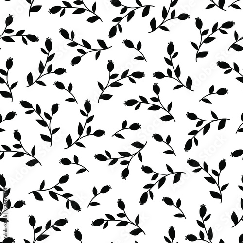 Trendy black and white vector texture. Monochrome floral seamless pattern. Fashion, fabric, ditsy print, wallpaper. Hand drawn silhouette wild flowers and leaves scattered random on white backgroud