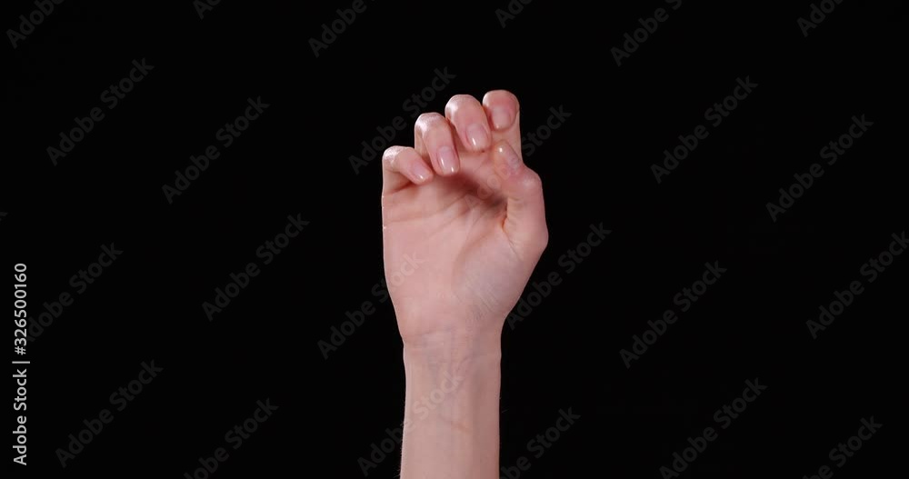 Woman showing S letter on black background, closeup. Sign language Woman showing S letter on black background, closeup. Sign language