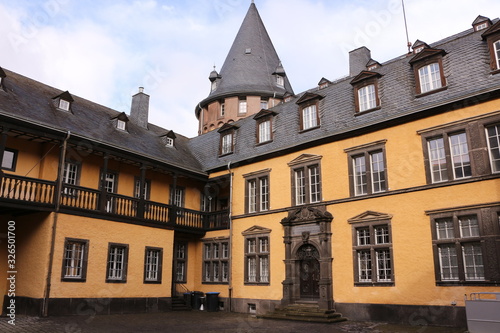 Historische Gebäude im Innenhof der Genovevaburg im Zentrum von Mayen in der Eifel photo