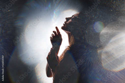 Double exposure of women face and galaxy. Abstract woman portrait on the background  of space world. Mystery astrology