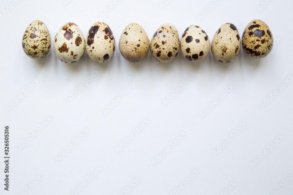 quail eggs on a white background. Easter and easter decoration quail eggs on a white background. Easter and easter decoration
